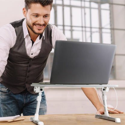 Aluratek Adjustable Ergonomic Laptop Cooling Table with Fan lifestyle standing up