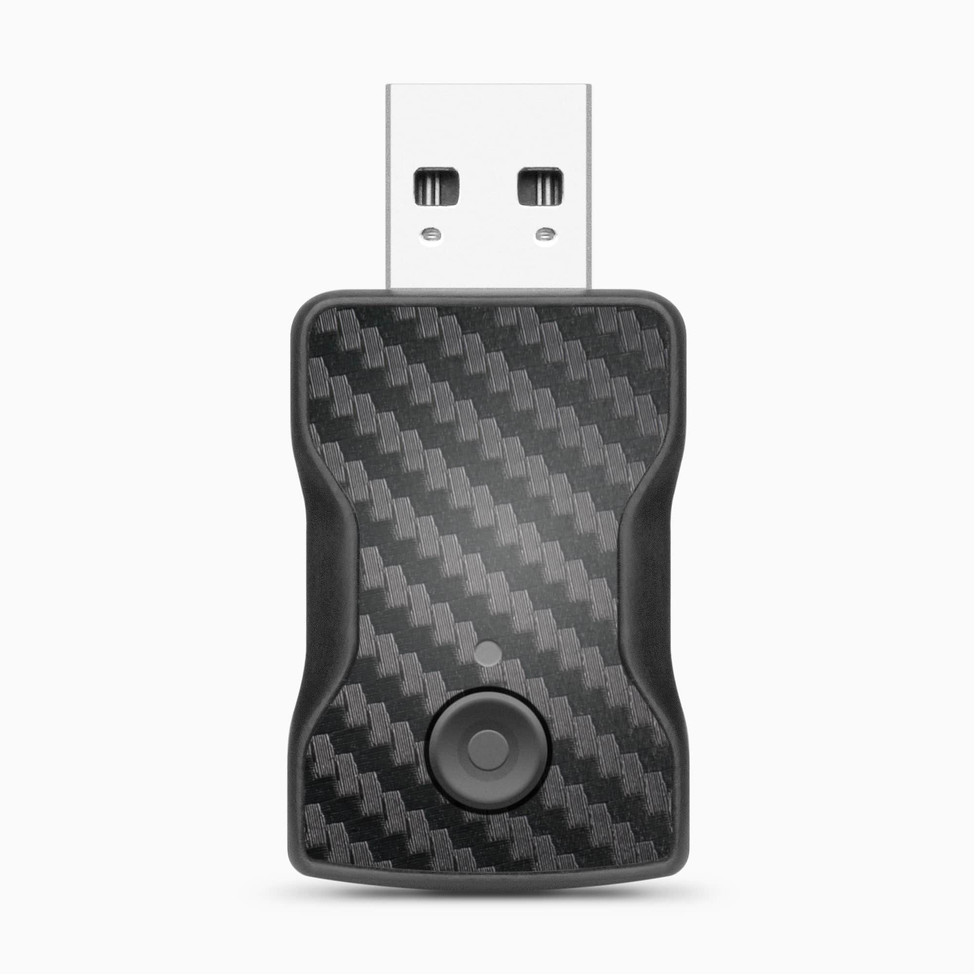 Compact wireless car adapter dongle on white background