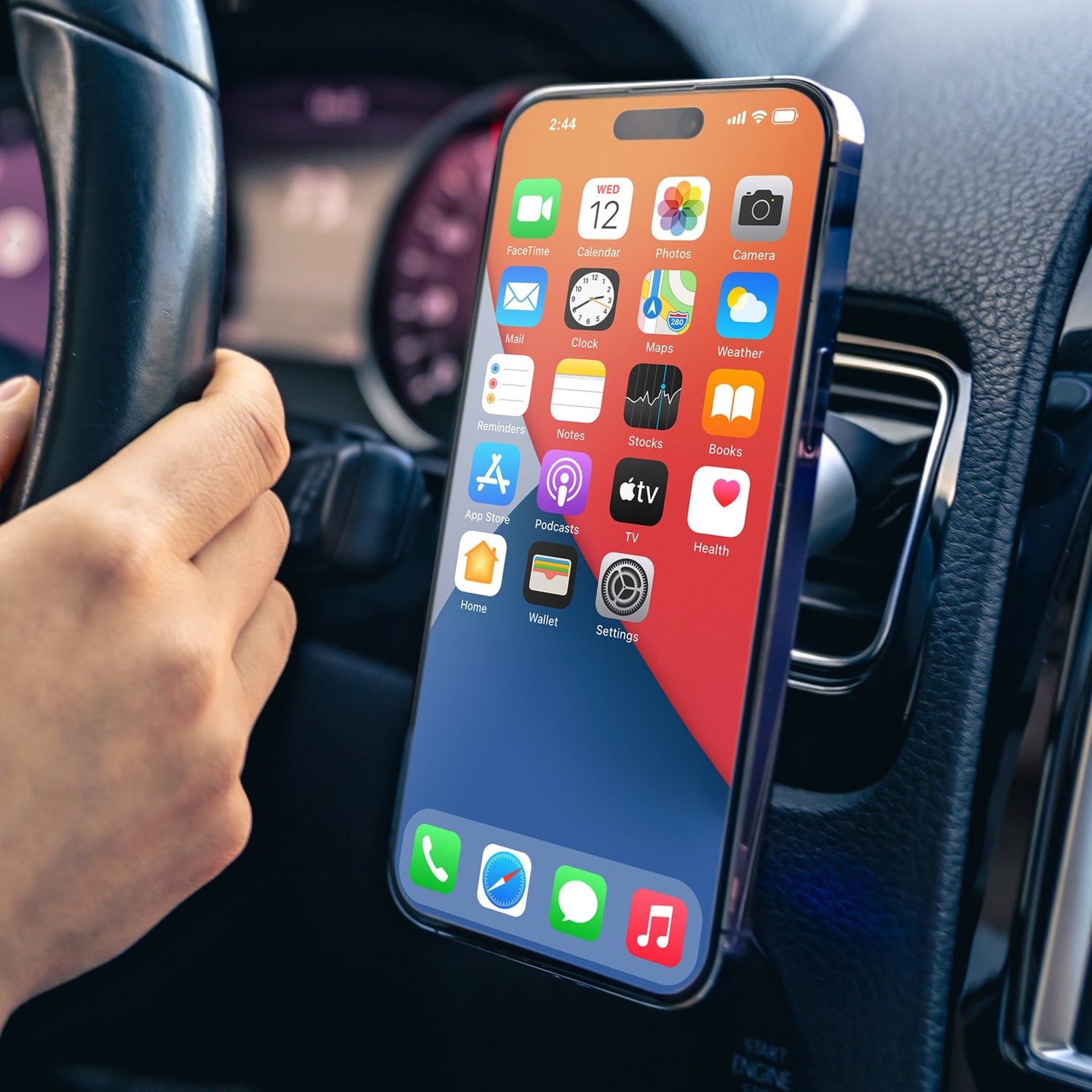Smartphone with app icons in a car mount.
